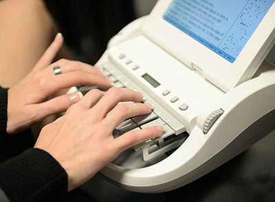 Student Types on Steno machine