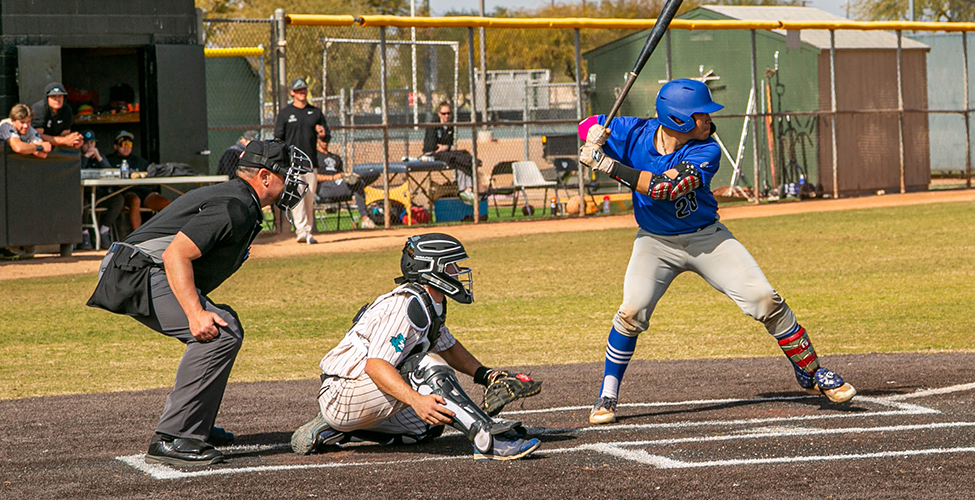 GateWay baseball player at home plate ready to swing bat