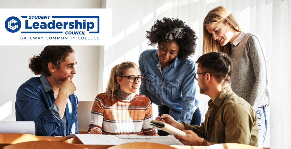 Group of students sitting at table talking