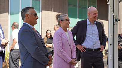 Governor Katie Hobbs stands alongside, Deputy Secretary David Turk and Dr. Steven R. Gonzales
