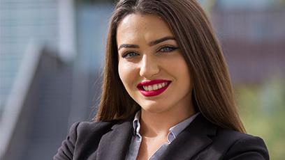 Arsenija Zlaticanin poses for a portrait in front of the IE building.