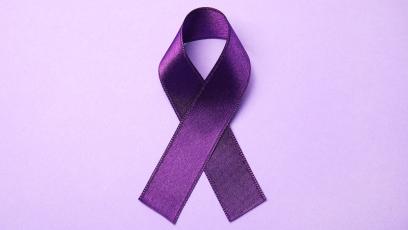 Purple ribbon on a light purple background