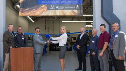 Ribbon cutting ceremony at the machining lab at Central City