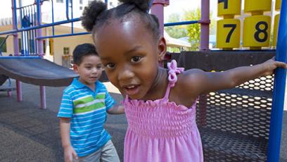 Two children playing outside