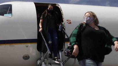 Jessica Stingle departing plane in Greely, CO