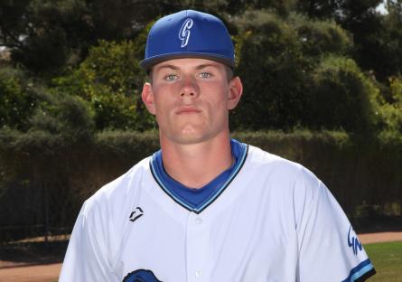 Matt Maize in a white Gecko baseball jersey and blue hat