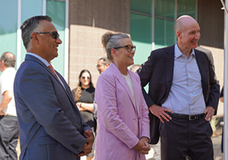Governor Katie Hobbs stands alongside, Deputy Secretary David Turk and Dr. Steven R. Gonzales