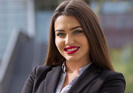 Arsenija Zlaticanin poses for a portrait in front of the IE building.