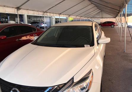 Auto Challenge Tent and Nissan Car