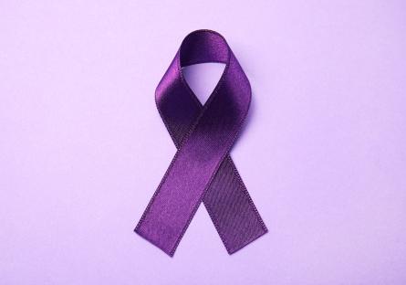 Purple ribbon on a light purple background