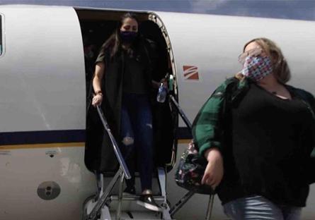 Jessica Stingle departing plane in Greely, CO