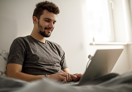 Man sitting with laptop
