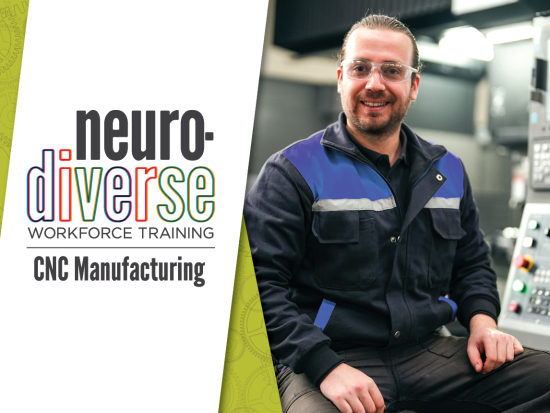 Male CNC machining operator looking at camera