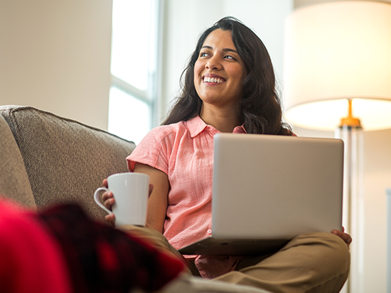Woman sitting on couch