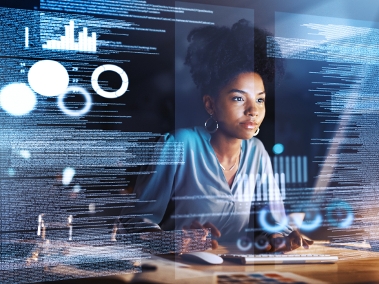 A woman looking at a computer screen, with data superimposed on top.