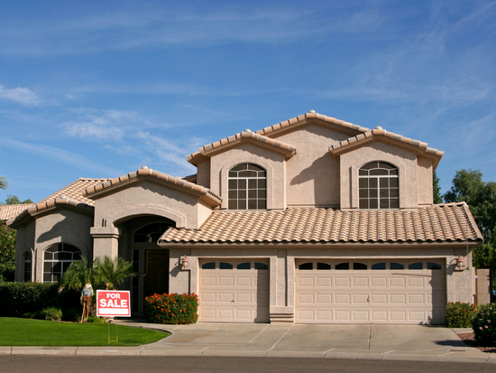 House with for sale sign out front