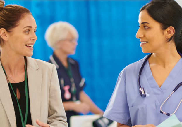 Two women starring at each other while conversating