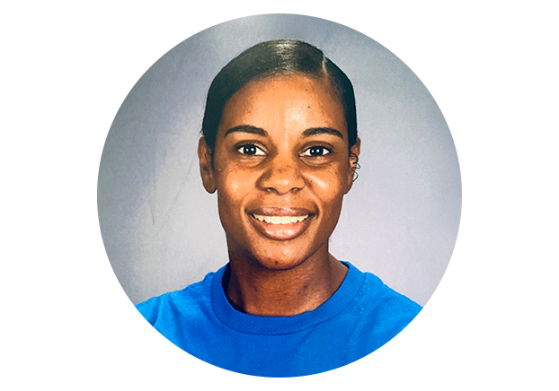 Woman smiling on a grey background