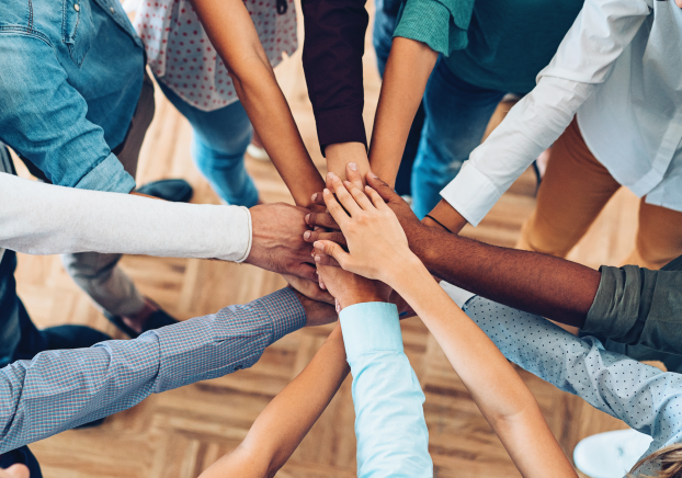 Group hands all in circle