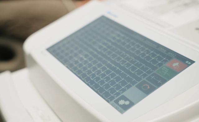 Diagnostic ECG monitor showing heart rhythm telemetry readings